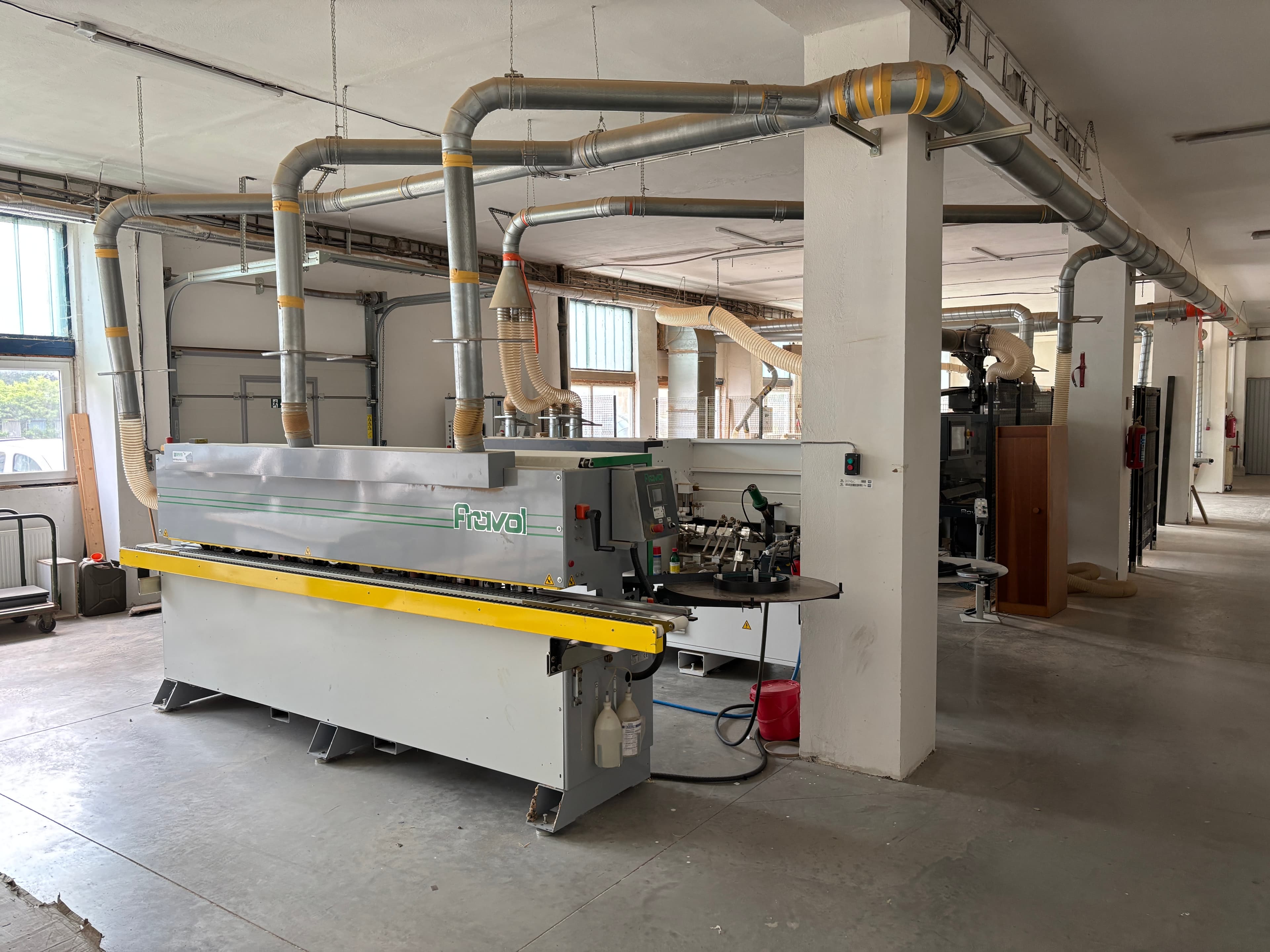 Fravol edge bander and the shop's overhead ducting network